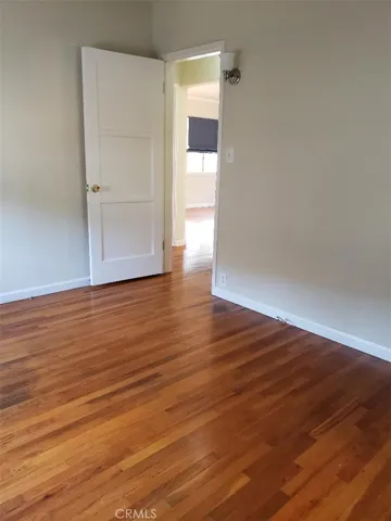 from living room looking through hallway to bedroom #2