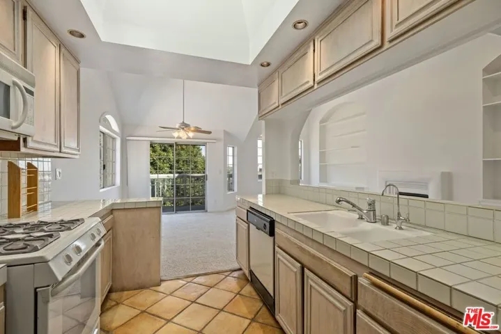 Kitchen overlooks the living room and dining area.