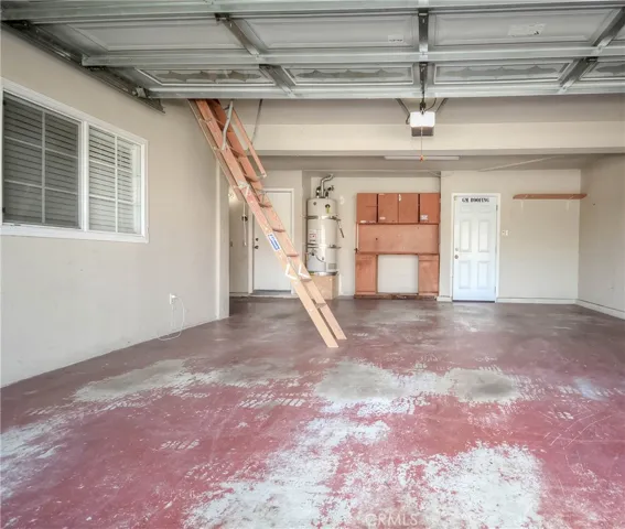 Drop down stairs to attic storage area