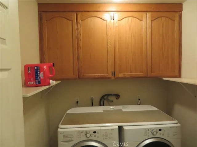 Laundry area with lots of cabinet storage