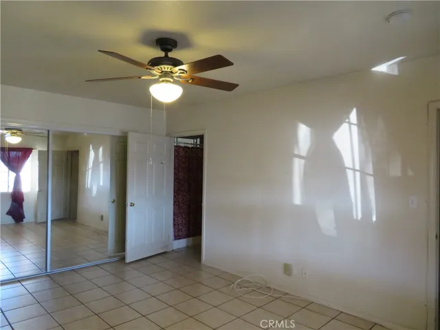 Different view of en-suite showing closet