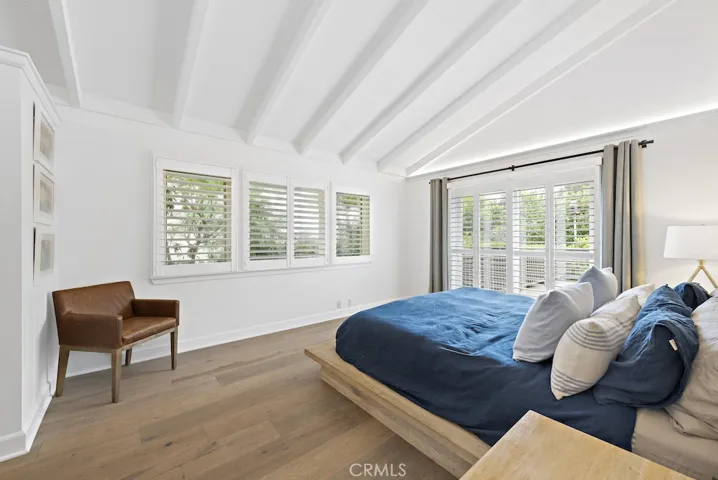 Master suite with doors leading to the back deck complete with ocean views.