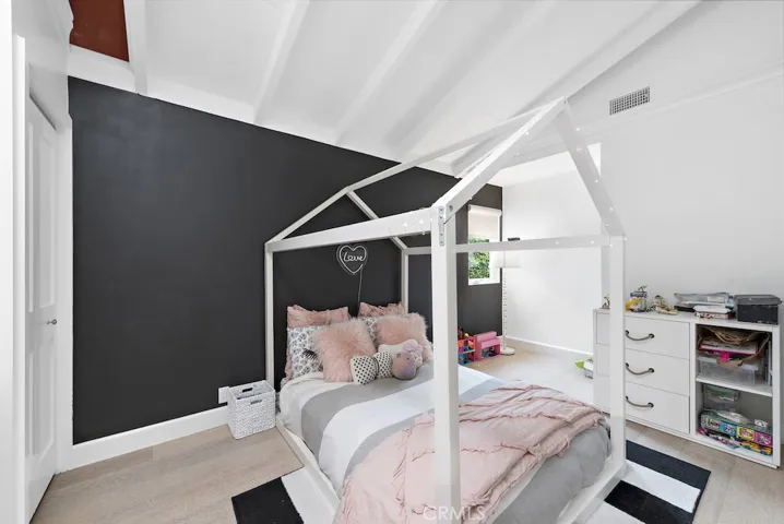 One of two spacious guest bedrooms.