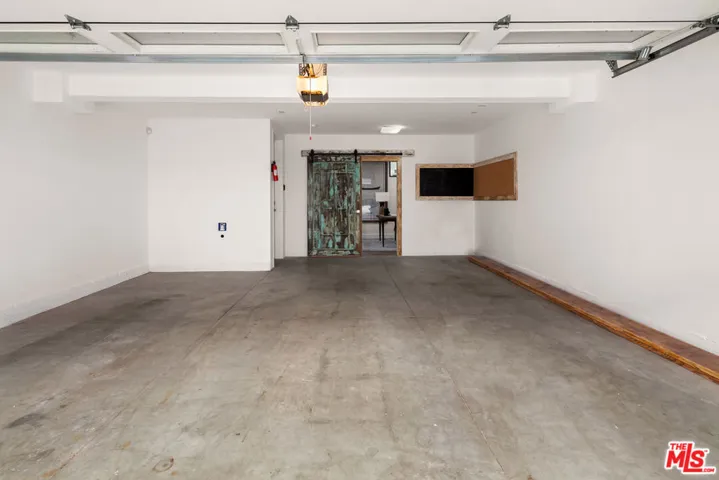 Huge 2 car garage with extra storage space