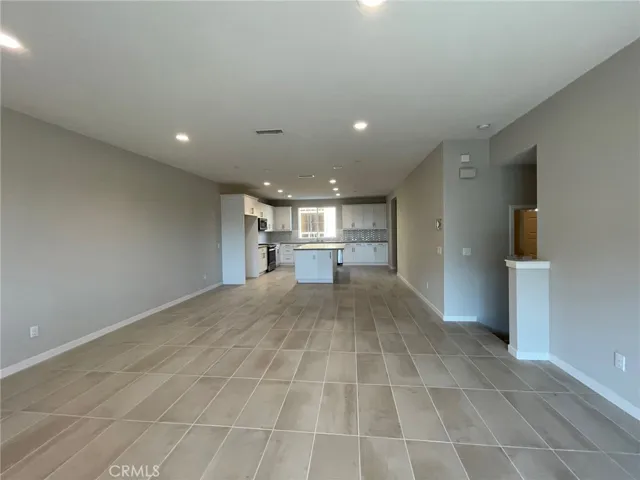 Huge open concept living w/ access to deck