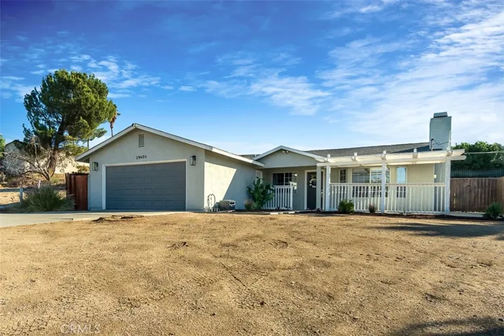 Front of home with with large lot and room for RV parking