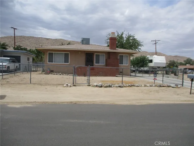 house down street to east the street