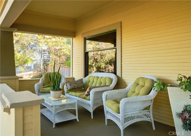 Front porch with multiple seating areas