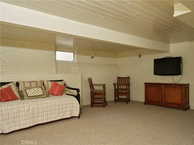 Partially finished basement with new carpet