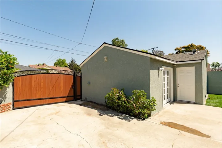 French Door Access to Added Bonus Workshop/Office attached to Garage with 1/2 bath