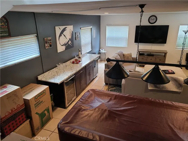 Massive family Room w/Fireplace and Built-in Bar/Serving Area