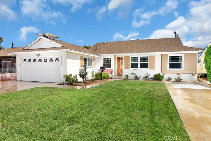 This beautiful home is located on a quiet street in one of Canoga Parks most sought after neighborhoods. The lush green lawn, colorful flower beds with fragrant roses and covered entry enhance its eye-catching curb appeal.