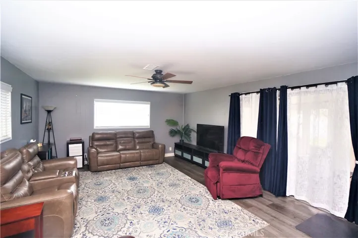 Family Room entrance from Dining Room. Sliding room to the right goes into the covered patio