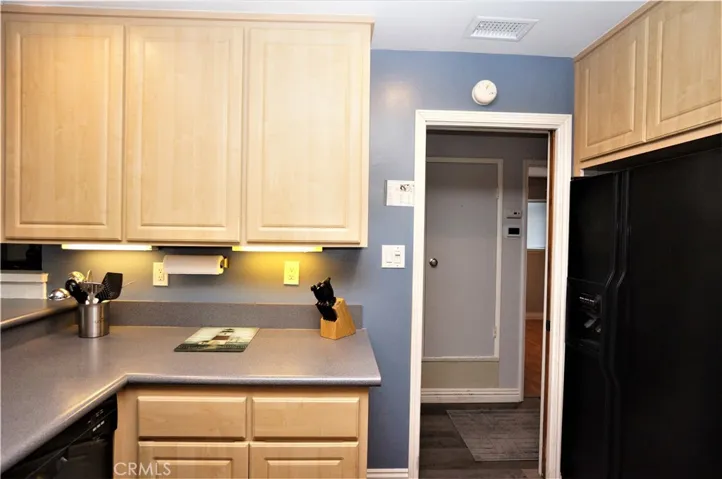 Door way to the Kitchen Pantry, hall and bedrooms