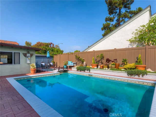 Private and peaceful backyard with large swimming pool, jacuzzi, and fairytale like foot bridge.