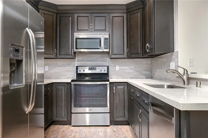 Kitchen with Refrigerator, Stove & Microwave