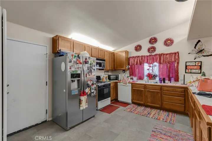 Nice size kitchen with access to the garage and laundry.