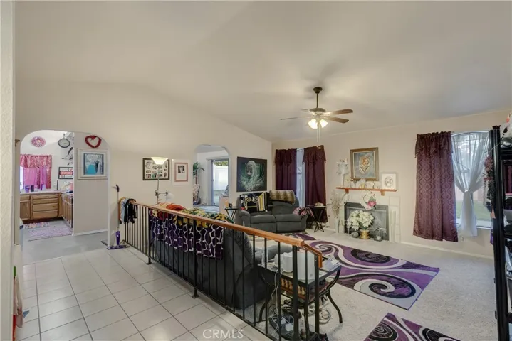 Step down living room with fireplace.