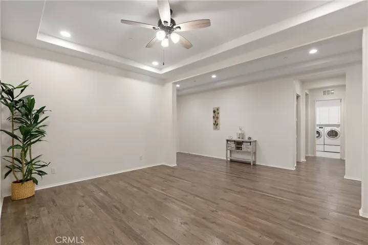 Formal Dining looking into guest bathroom, laundry and mud room.