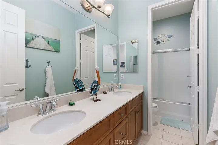 Bathroom with dual vanities