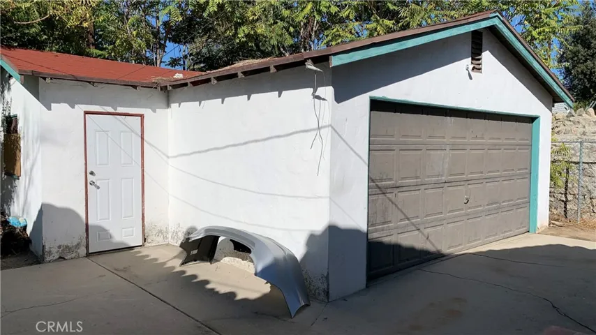 2 car garage with extra storage on the left