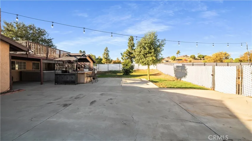 Large patio area in backyard