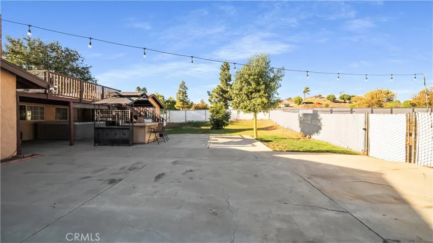 Large patio area in backyard