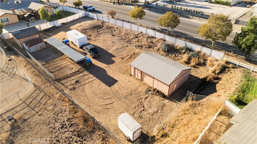 Aerial view of horse area and larger building