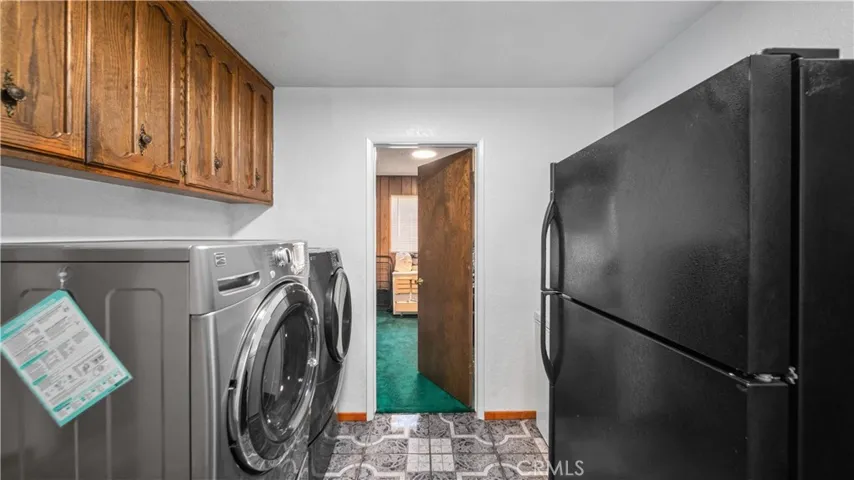Another view of laundry room, leads to Bedroom #5