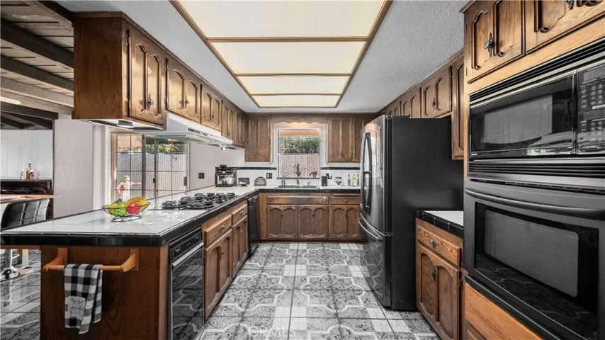 Kitchen with lots of cabinets and countertops