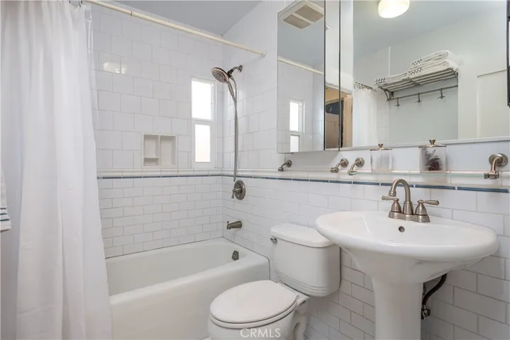 Full bath updated with modern systems and period specific stylings