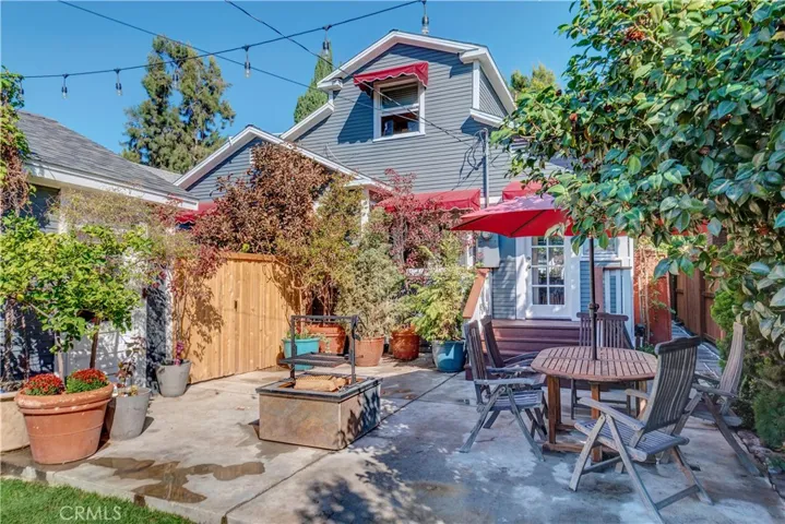 Gate off of patio separates the front of the garage from the patio - perfect for a pooch or play area