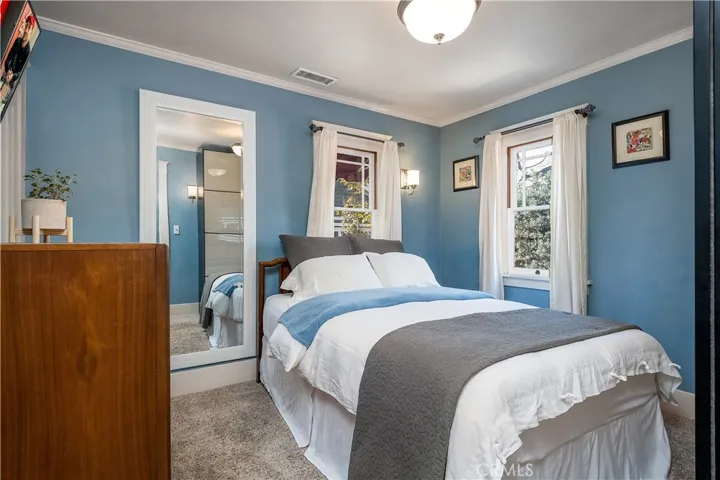 Master bedroom with original double hung windows