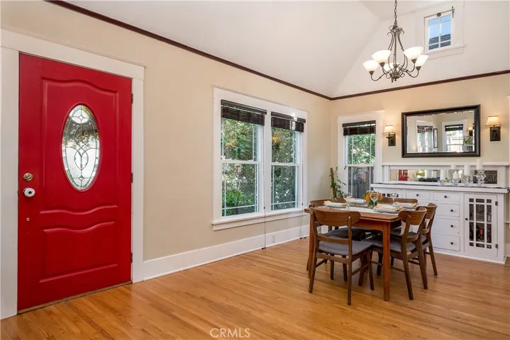 The dining area conveniently located near the original built in hutch