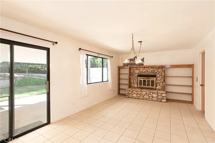 Dining room with wood burning fireplace