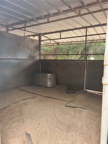 Inside a covered horse stall