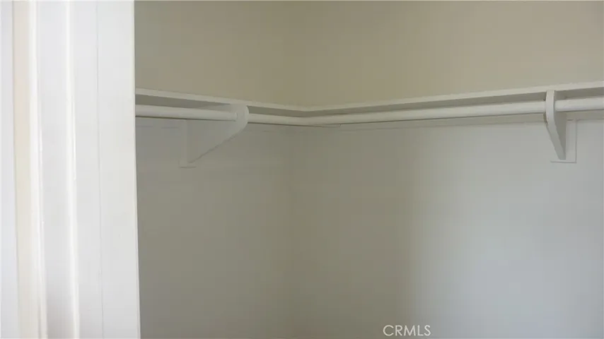 Bedroom large walk-in closet.