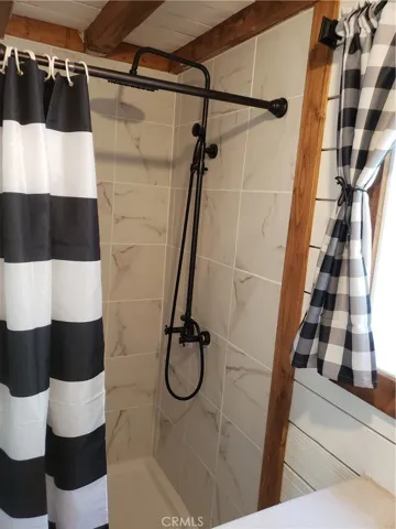 shower in cottage with loft
