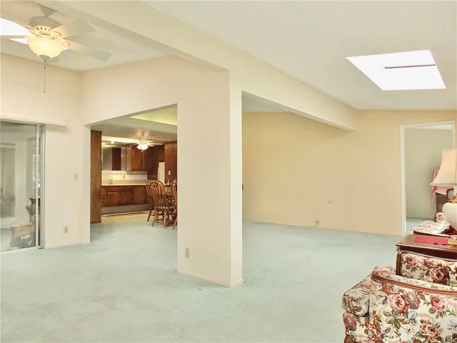 View of kitchen and large skylights that make this unit very light and bright