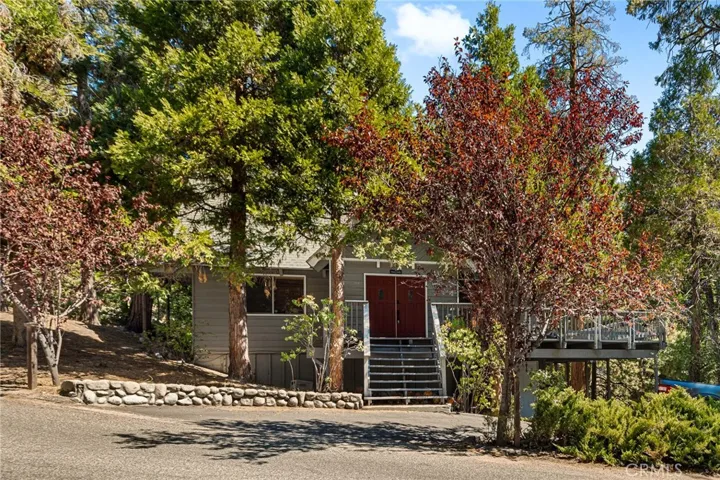 Circular driveway w/ parking under the deck too.