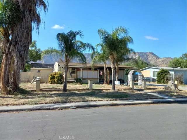 Home is on a paved street and a flat 1/2 acre lot.