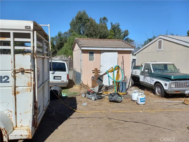 Storage shed built behind the 2 car garage.