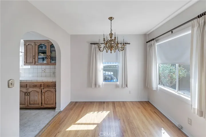 Formal Dining Room with Chandelier & 2 Windows