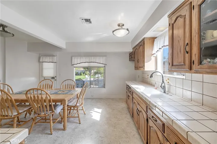 Large Open Kitchen-Oak Cabinets Glass Inserts