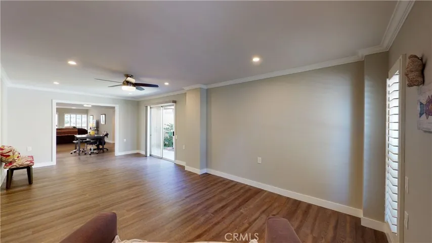 Remote control ceiling fan and dimmable LED recessed lighting.