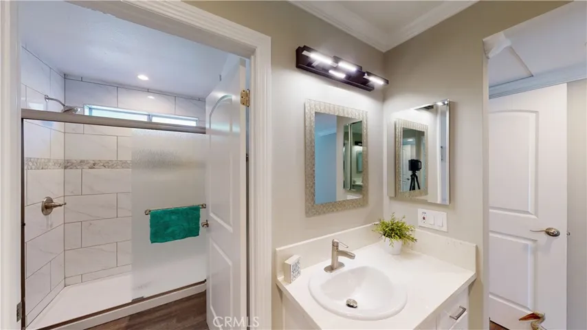 Master bath with all new fixtures, finishes, tub & tile, new LED lighting fixtures.