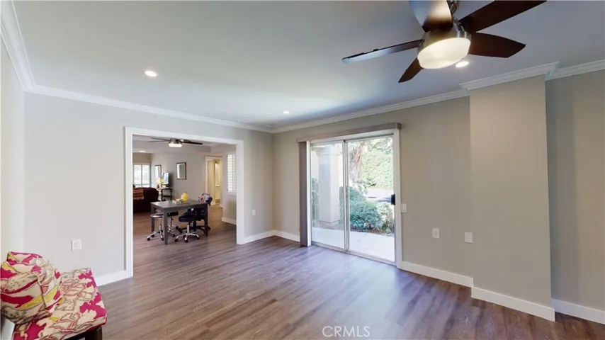 Remote control ceiling fan and dimmable LED recessed lighting.