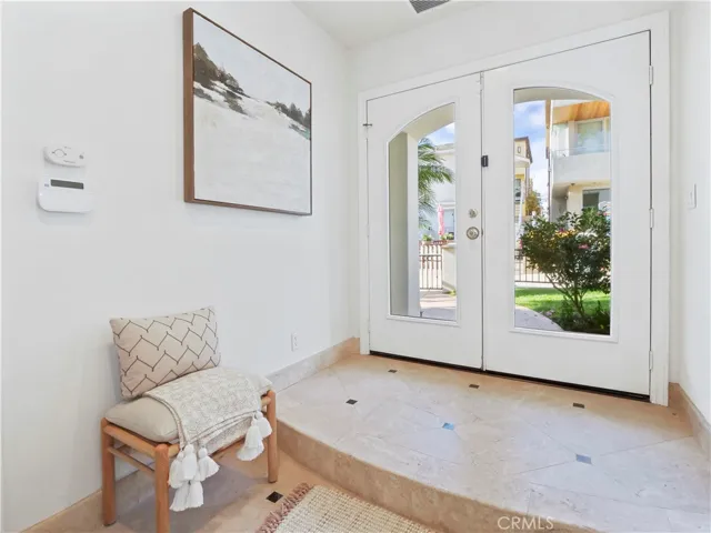large entry way with french doors