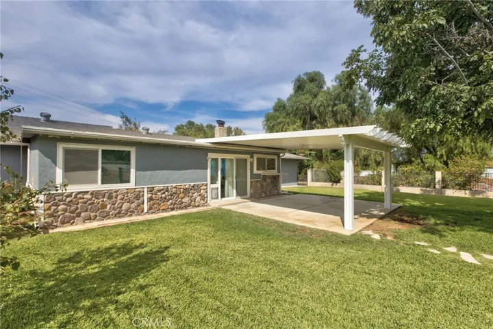 Newer patio cover with ceiling fan