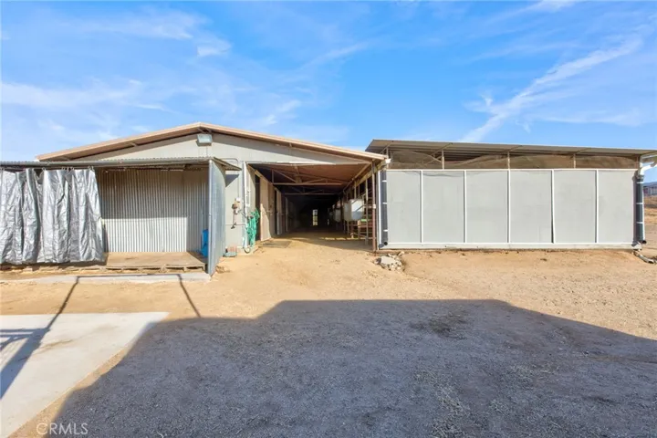 Barn with storage area for feed